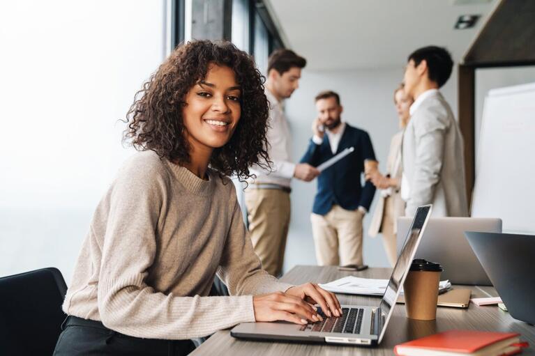 Happy property manager running tenant applications